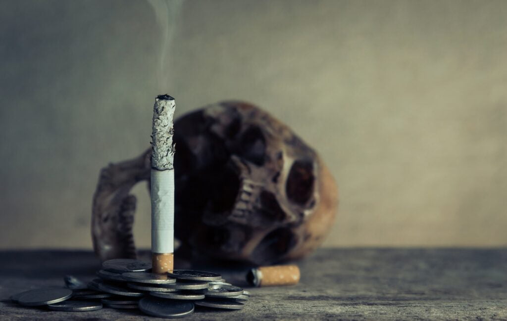 Photo En Gros Plan De Cendres De Cigarettes Brûlées