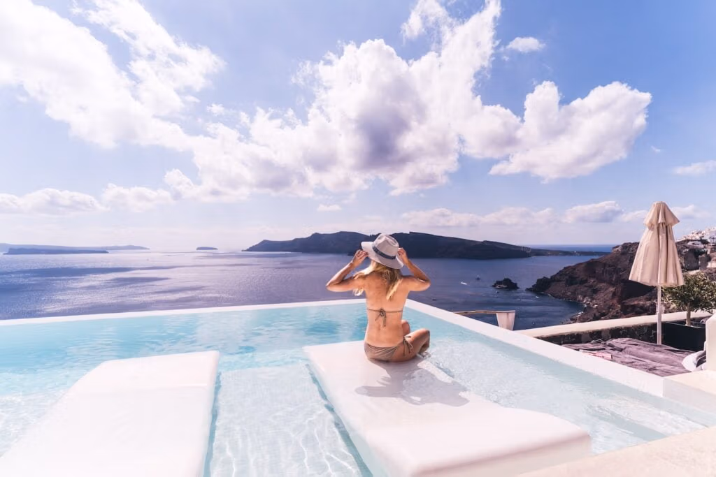 woman sitting on white chair near body of water during daytime, The Benefits of Hair Transplant in Antalya for Women