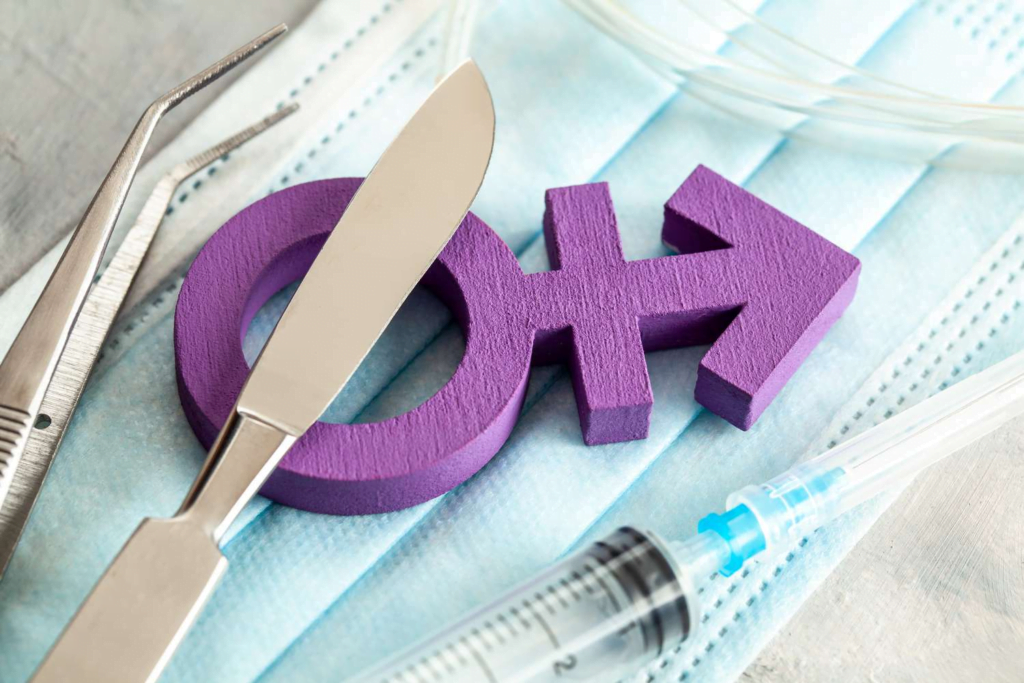 Purple wooden letters "OXY" placed on medical gauze with surgical tools including a scalpel, forceps, and a syringe, symbolizing medical or surgical context.