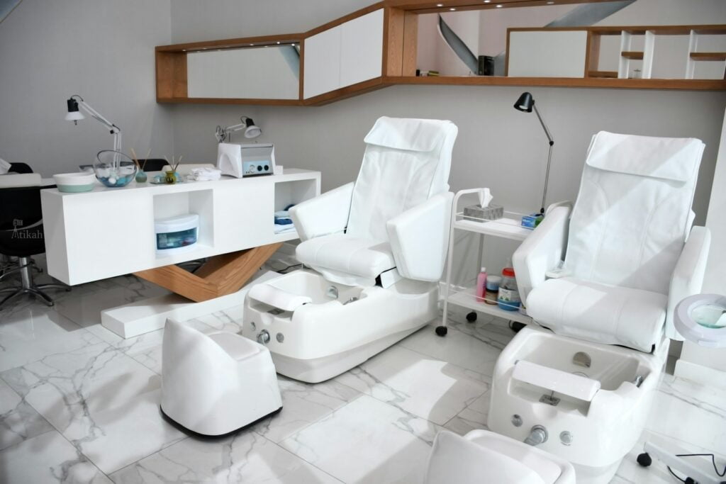 white rolling chairs near brown wooden desk. cheapest forehead reduction