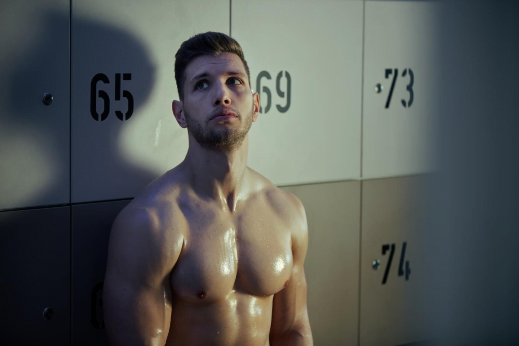 What are the specific procedures involved in body masculinization surgery?