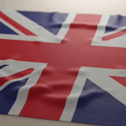 Een close-up van de Union Jack-vlag, met het iconische rood-wit-blauwe ontwerp met overlappende diagonale en verticale kruizen.