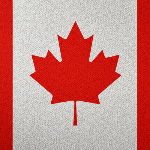 Vlag van Canada met een rood esdoornblad op een witte achtergrond, geflankeerd door twee verticale rode balken.